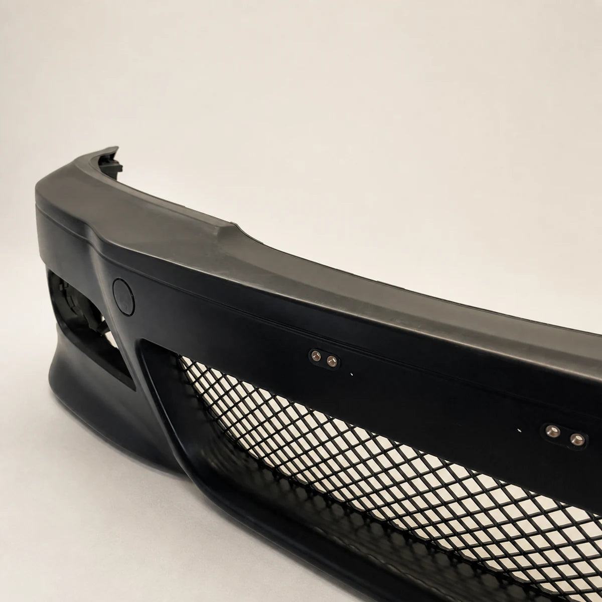 Paragolpe BMW E46 Serie 3 99-06 M3 Plástico con Antinieblas. [irp-catalog:bump004-gallery-3-c.webp:e6d6602a9b41096c]