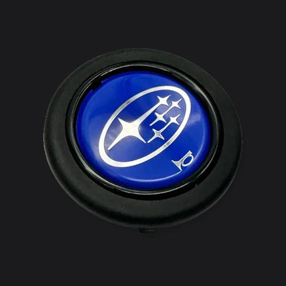 Pulsador de Bocina logo Subaru para Volante Deportivo tipo Nardi Omp Momo Gp Race. [IRP-CATALOG:HORN001-SUB-GALLERY-1-O.webp:9af0d785c11989a4]