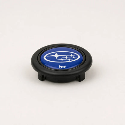 Pulsador de Bocina logo Subaru para Volante Deportivo tipo Nardi Omp Momo Gp Race. [irp-catalog:horn001-sub-gallery-2-c.webp:fa2ff618247b3a15]