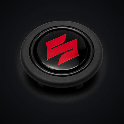 Pulsador de Bocina logo Suzuki para Volante Deportivo tipo Nardi Omp Momo Gp Race. [IRP-CATALOG:HORN001-SUZ-1-O.webp:4125b4d598020668]