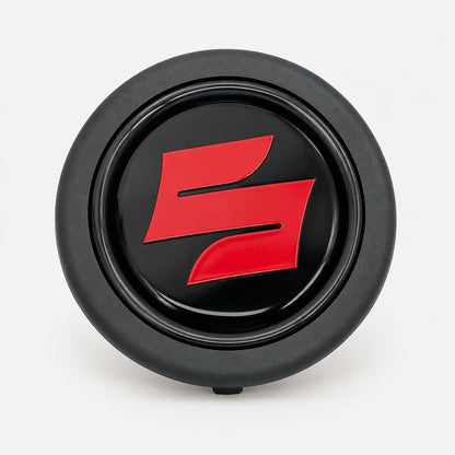 Pulsador de Bocina logo Suzuki para Volante Deportivo tipo Nardi Omp Momo Gp Race. [irp-catalog:horn001-suz-gallery-2-c.webp:e7df82b4b1bf129d]