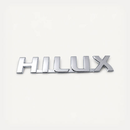 Emblema Toyota Hilux 19x3.3cm. [IRP-CATALOG:INSI006-1-C.webp:d9e1536570442354]