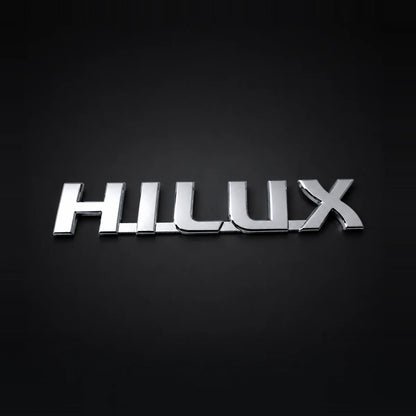Emblema Toyota Hilux 19x3.3cm. [IRP-CATALOG:INSI006-1-O.webp:4922f5febf910a71]