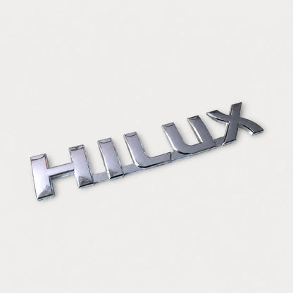 Emblema Toyota Hilux 19x3.3cm. [IRP-CATALOG:INSI006-GALLERY-1-C.webp:d159e442bf7d0844]
