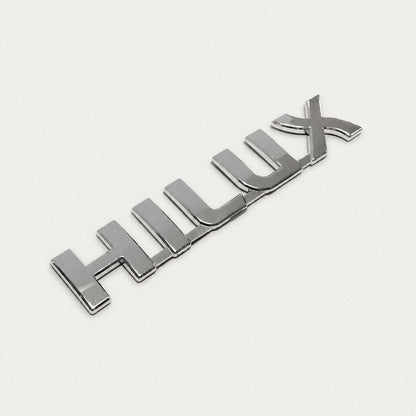 Emblema Toyota Hilux 19x3.3cm. [IRP-CATALOG:INSI006-GALLERY-2-C.webp:ed65a946d0c5566d]