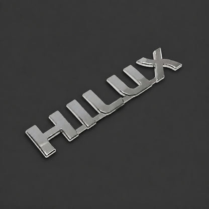Emblema Toyota Hilux 19x3.3cm. [IRP-CATALOG:INSI006-GALLERY-2-O.webp:291cfd29743a26b0]