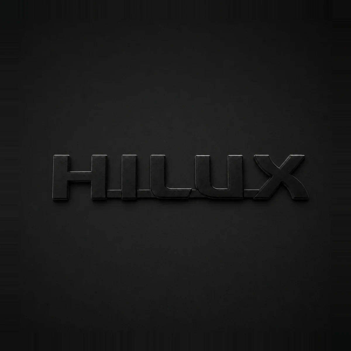 Hilux Emblema Negro Mate Toyota 19x3.3cm. [IRP-CATALOG:INSI012-1-O.webp:688c07f99221c1e9]