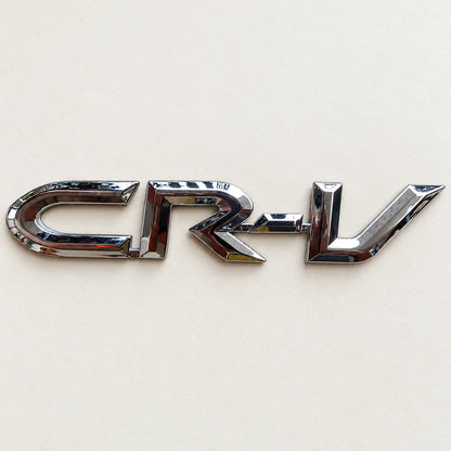 Emblema Portón Trasero para Honda CRV 01-06 2G. [IRP-CATALOG:INSI021-GALLERY-3-C-f3209da5612b4303.webp:f3209da5612b4303]
