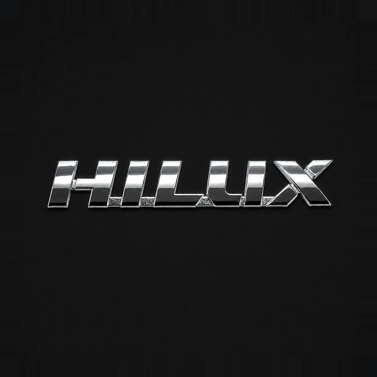Emblema Toyota Hilux Linea Nueva 2016-2025. [IRP-CATALOG:INSI029-1-O.webp:6addd5f5ae4d819e]