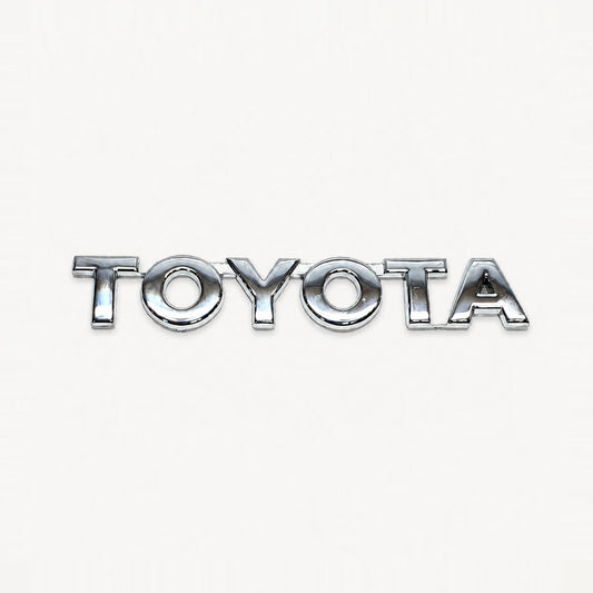 Emblema de Toyota Hilux palabra TOYOTA Cromado 150X28mm. [IRP-CATALOG:INSI035-1-C.webp:966609f3ada9a69c]