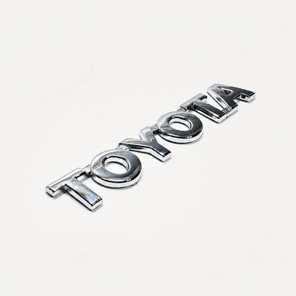 Emblema de Toyota Hilux palabra TOYOTA Cromado 150X28mm. [irp-catalog:insi035-gallery-1-c.webp:0ffc092025aae1fc]
