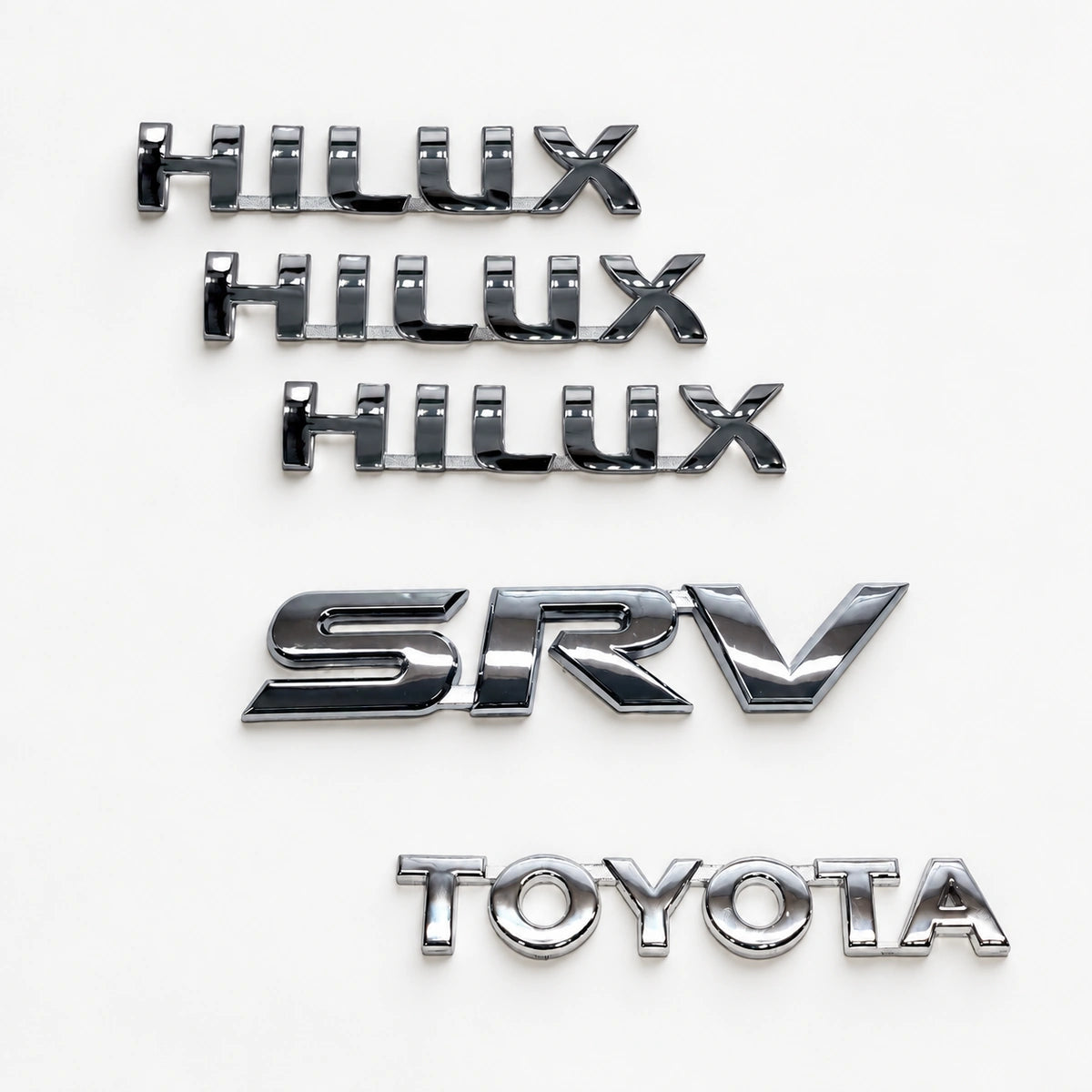 Kit Emblemas Traseros y Laterales para Toyota Hilux Srv 05-15. [IRP-CATALOG:KIT-X5-EMB-SRV-05-15-GALLERY-1-C-6d779a8add9eb370.webp:6d779a8add9eb370]