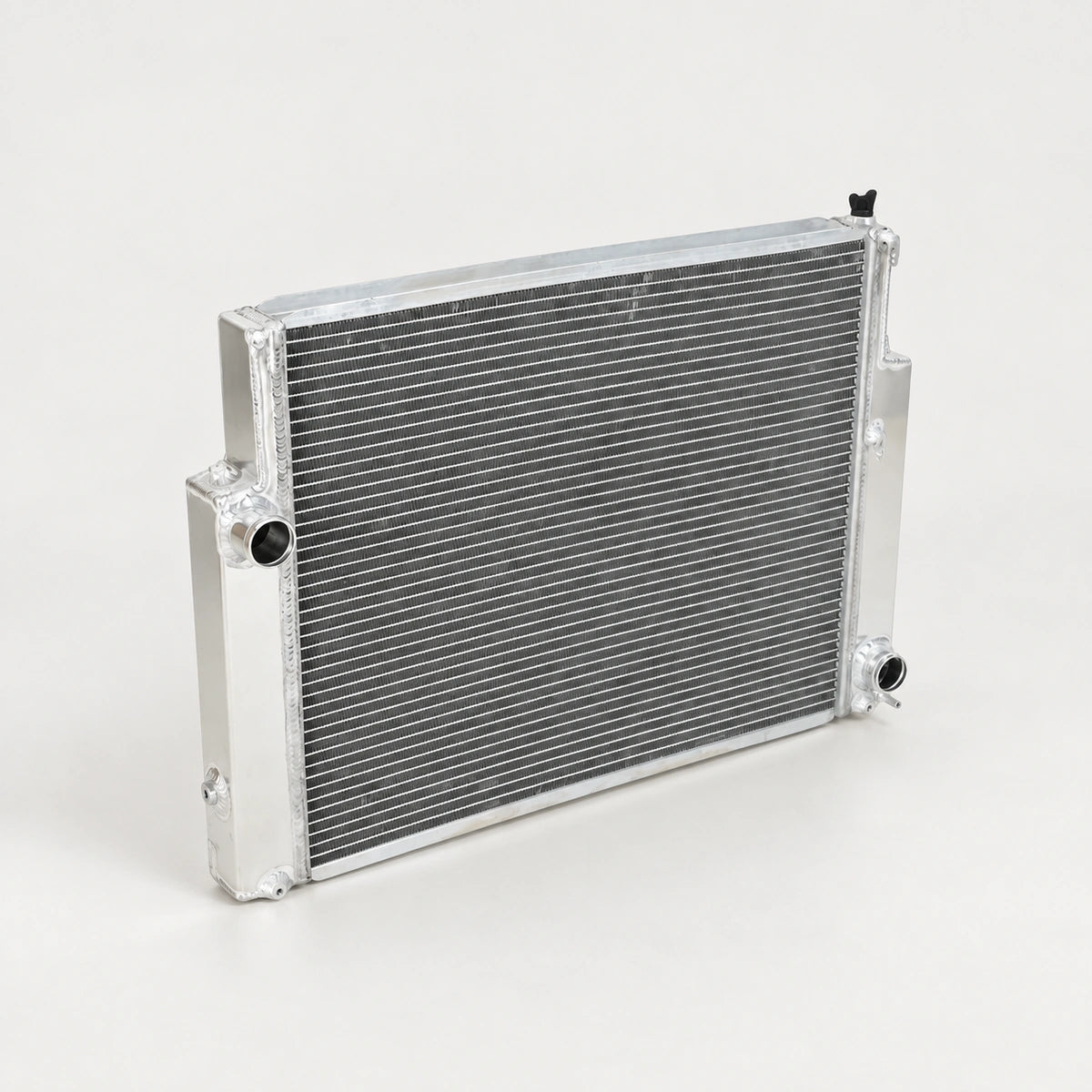 Radiador Aluminio doble Fila BMW E36 MT Manual. [IRP-CATALOG:RADI004-GALLERY-1-C-53a142df6a82305e.webp:53a142df6a82305e]